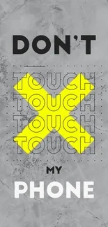 Gray wallpaper with bold 'Don't Touch My Phone' text and yellow cross.