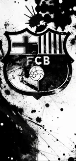 Black and white emblem with ink splashes on mobile wallpaper.