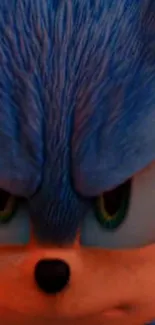 Close-up of a blue animated character's expressive face.