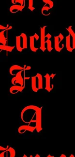 Bold red gothic text on black wallpaper.