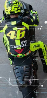 Motorcycle racer in neon yellow gear from above view.