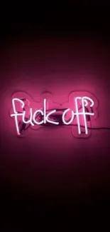 Neon pink text on dark wallpaper background.