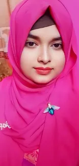 Vibrant pink hijab wallpaper for mobile display.