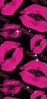 Bold pink lips with 'xoxo' text on black wallpaper.