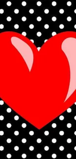 Bold red heart with black polka dots background.