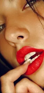 Close-up portrait of bold red lips.