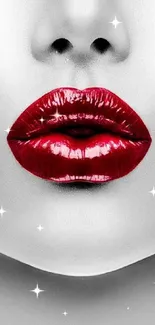 Glossy red lips on monochrome gradient background, stylish and bold.