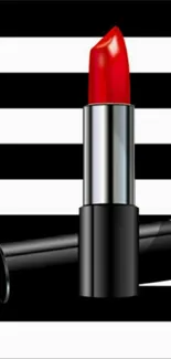 Red lipstick on black and white stripes background.