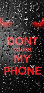 Black wallpaper with red text 'Don't Touch My Phone' for mobile.