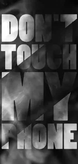 Bold "Don't Touch My Phone" text design on a black background.