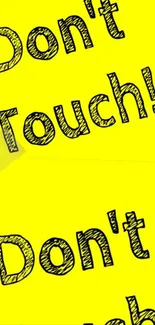 Bold yellow wallpaper with 'Don't Touch!' message.