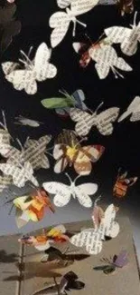 Paper butterflies emerging from an open book in a creative and artistic wallpaper design.