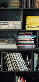 Bookshelf with vintage books and vinyl records mobile wallpaper.