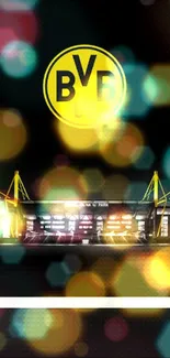 Borussia Dortmund stadium at night with BVB logo.