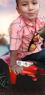 Boy sitting on a red sports car with sunglasses.