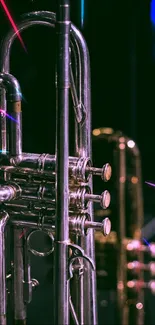 Close-up of a brass trumpet against a dark background, featuring elegant metallic tones.