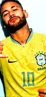 Brazilian soccer player in yellow jersey making hand gestures.