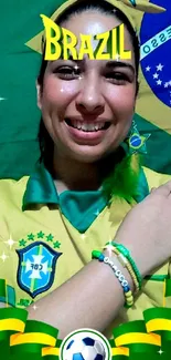 Brazilian soccer fan in yellow jersey with flag backdrop.