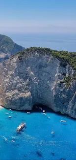 Stunning coastal view with blue water and cliffs, perfect for a beach wallpaper.