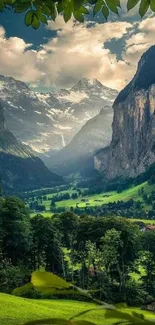 Breathtaking view of a lush green valley with mountains and a cloudy sky.