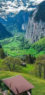 Serene mountain valley with lush greenery and majestic cliffs.