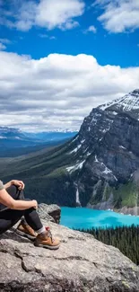 Woman admiring the mountain view with clear blue skies.