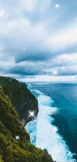 Breathtaking view of ocean and cliffs with sparkling waves and cloudy sky.