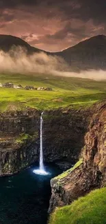 Serene landscape with waterfall and cliffs under a mystical sky.