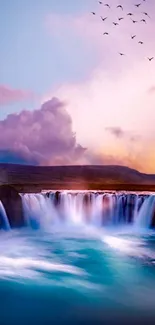 Vibrant waterfall under a colorful sky with birds flying overhead.