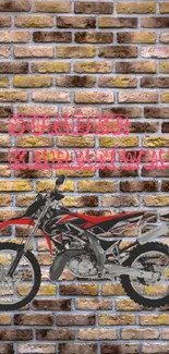 Motorcycle graphic on brick wall backdrop.