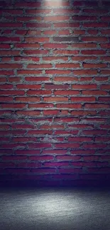 Dimly lit red brick wall with spotlight.
