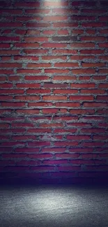 Moody brick wall under spotlight wallpaper.