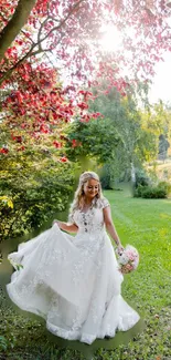 Bride in white dress in a sunlit garden with floral bouquet.