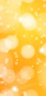 Orange bokeh wallpaper with glowing circles and sparkles.