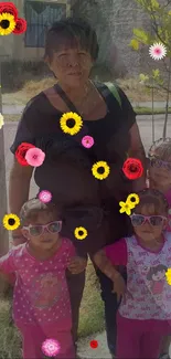 Family portrait with vibrant floral accents and colorful sunglasses outdoors.