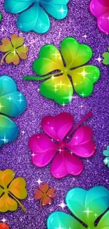 Vibrant clover leaves on a purple glitter background.