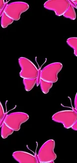 Vibrant pink butterfly pattern on black background.