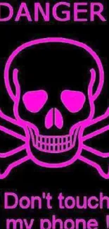 Neon pink skull with warning text wallpaper.