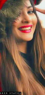 Woman smiling in a red fur hat, close-up portrait.