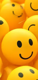 Bright yellow smiling faces wallpaper with cheerful expressions.