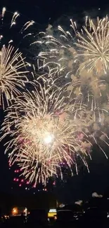 Vibrant fireworks exploding in the night sky, creating a colorful spectacle.