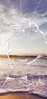 Surreal beach scene with cracked glass effect over ocean waves at sunset.