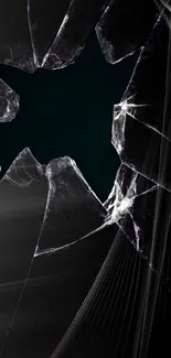 Broken glass mobile wallpaper with a dark, dramatic design.