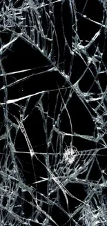 Broken glass wallpaper with dark background for mobile phones.