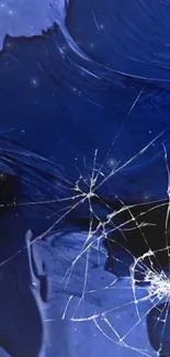 Blue cracked screen wallpaper with cosmic design and artistic flair.