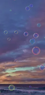 Vibrant sunset sky with floating bubbles over the ocean.