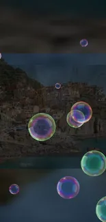 Colorful bubbles floating over a cliffside village view.