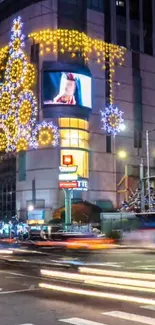 A vibrant city street with dynamic lights and colorful traffic, captured at night.