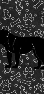 Black bulldog silhouette on paw print pattern wallpaper.