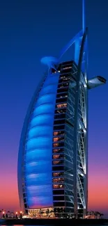 Burj Al Arab at twilight with blue and orange sky, beautiful Dubai skyline.